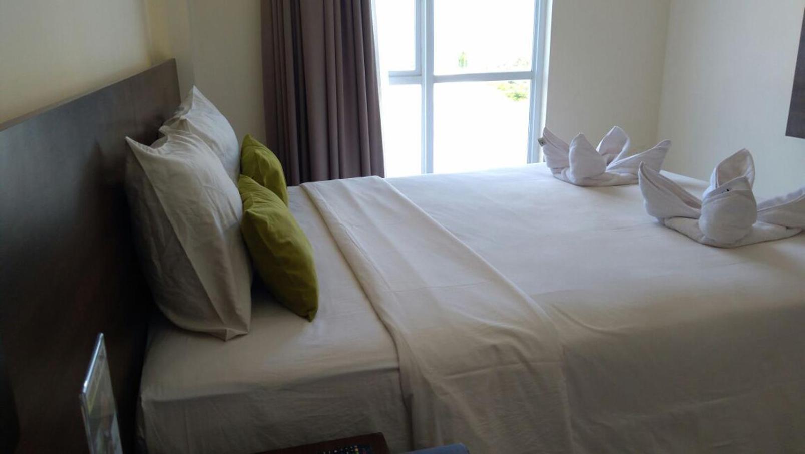 Green Eden Hotel Manado Phòng bức ảnh