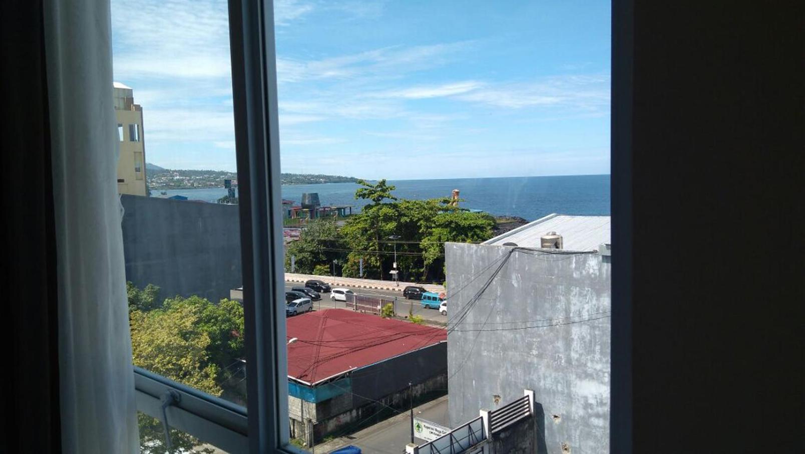 Green Eden Hotel Manado Phòng bức ảnh